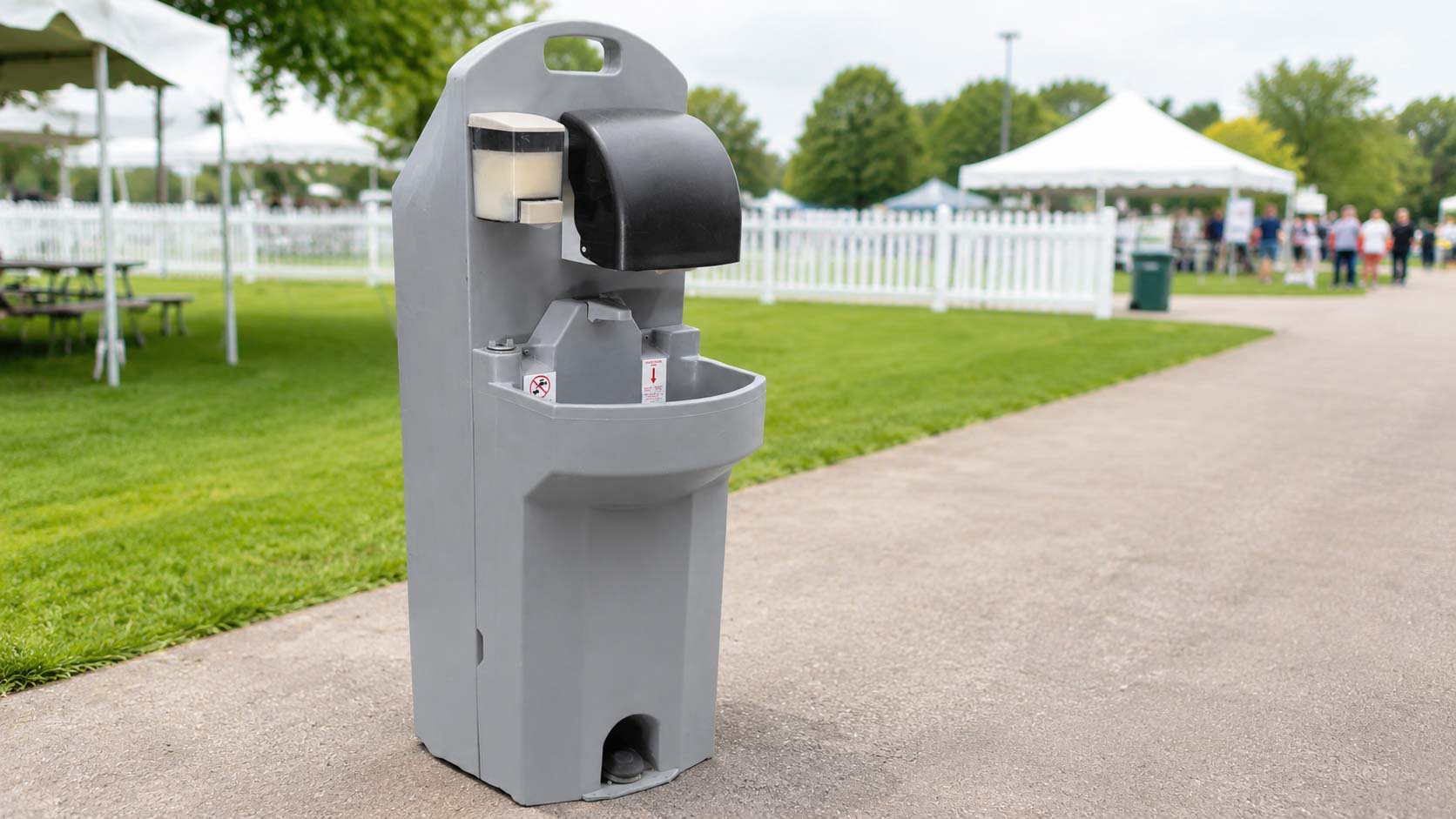 Portable hand wash station positioned near an outdoor Event